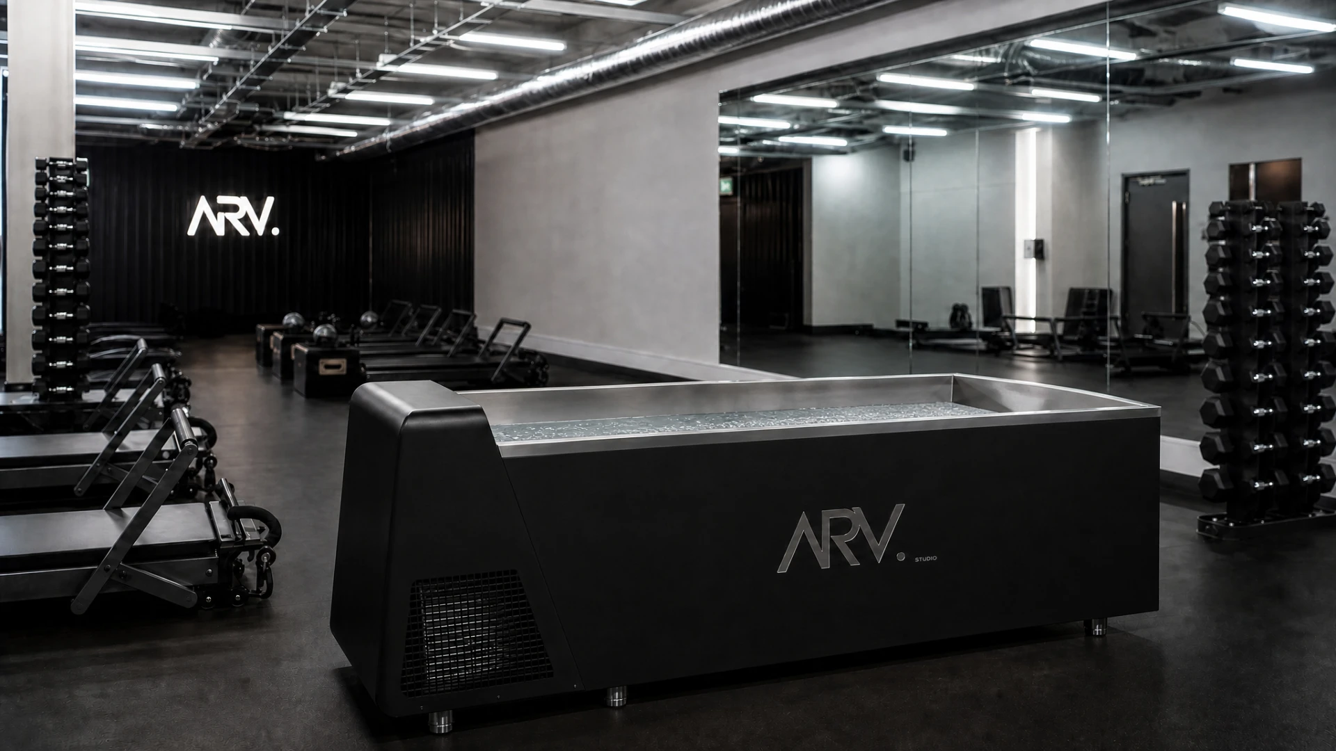 Icefall ice bath wrapped in matte black with a studio logo on the side panel