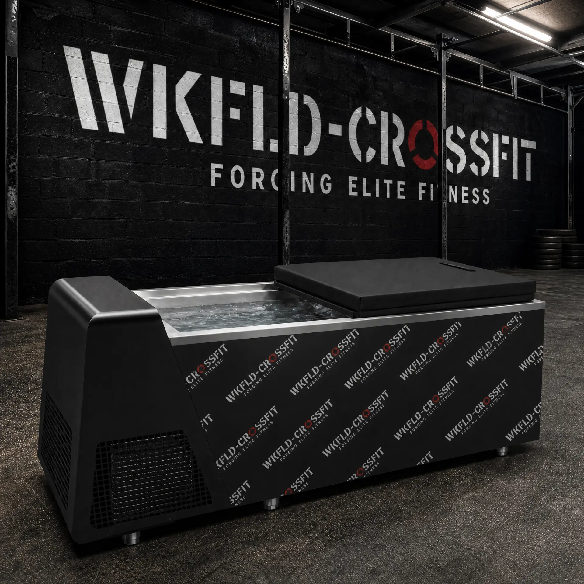 Icefall ice bath with a custom matte black branded wrap in a gym